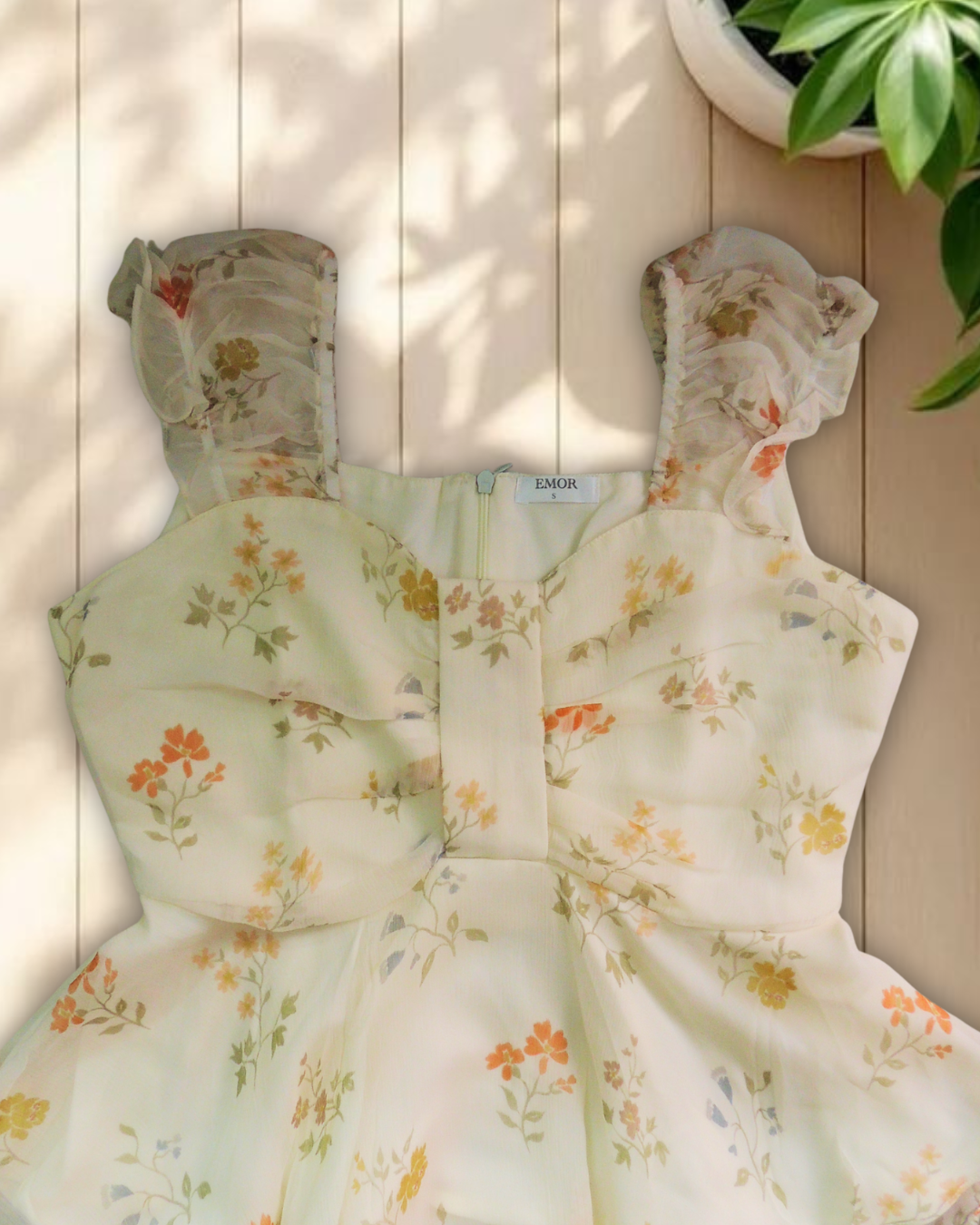 Ivory bloom peplum top