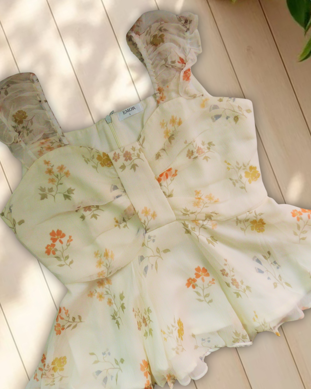 Ivory bloom peplum top